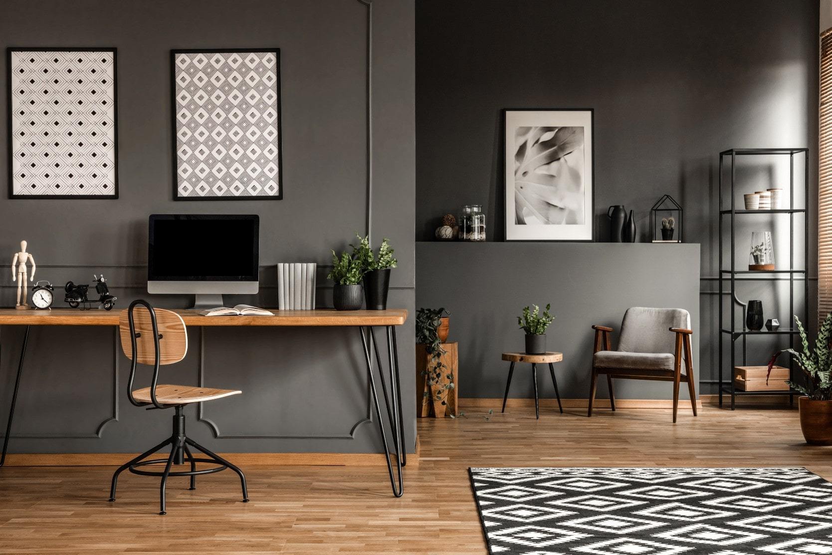 Modern home office with grey, black and white color scheme
